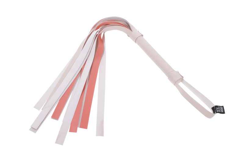 Sportsheets Peaches 'n CreaMe Flogger: cream faux leather handle with cream and peach falls