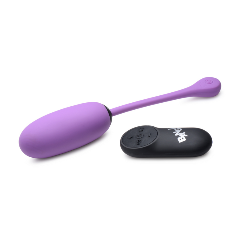 Bang! plush egg vibrator with remote in purple: velvety purple egg with a cord control tail and black wireless remote