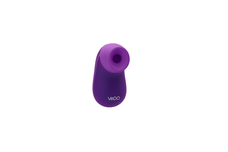 VeDO Nami Sonic in purple: compact silicone clitoral suction vibrator with a round mouth opening, angled view