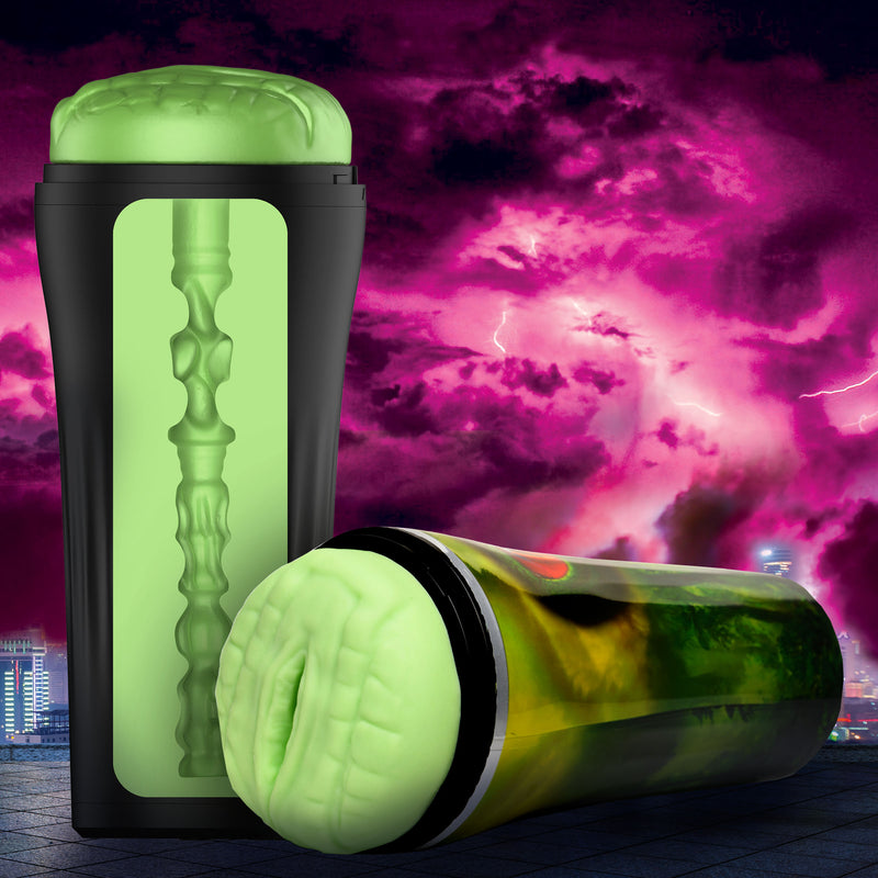 Creature Cocks Raptor reptile stroker: green squishy masturbator sleeve in a black case, beside its camo reptile eye case