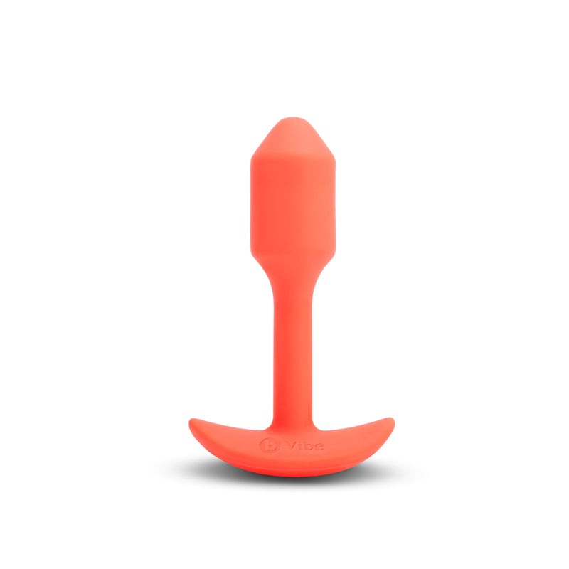 b-Vibe Vibrating Snug Plug in orange, small: vibrating weighted silicone butt plug with a slim neck and anchor base