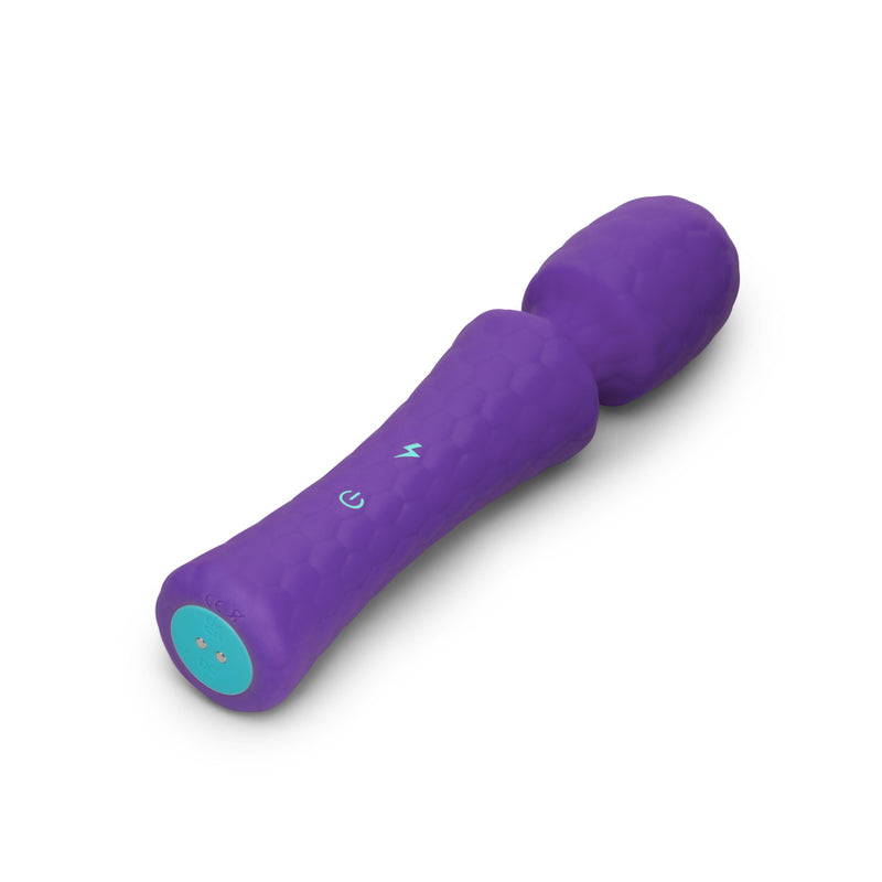 VibeFantasy Love Wand: purple textured silicone wand massager with a flexible head and teal charging base