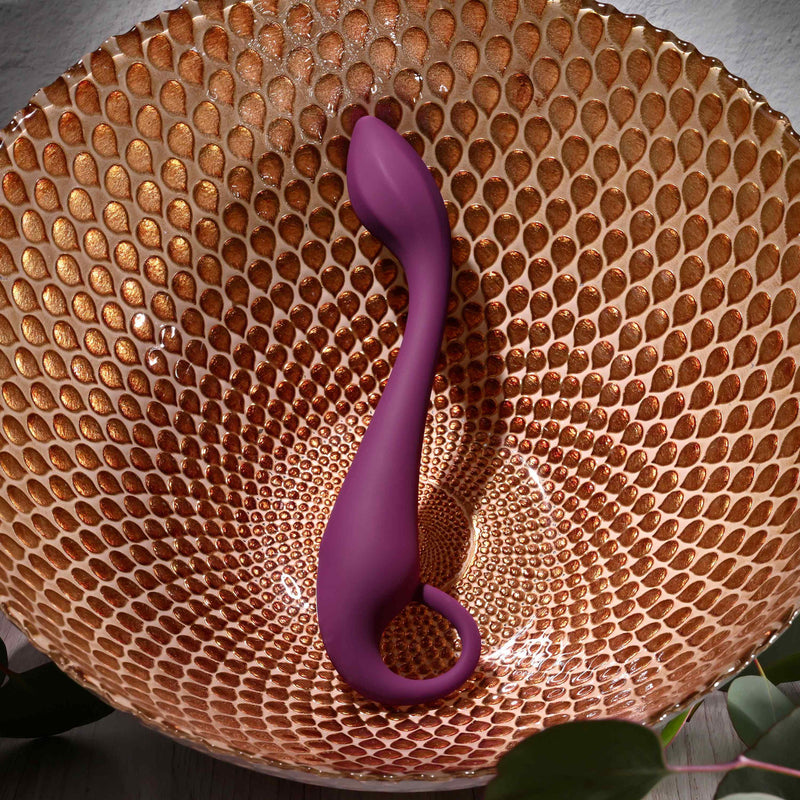 Evolved Lochness G vibe in purple: curved silicone G-spot vibrator with a slim neck and loop handle