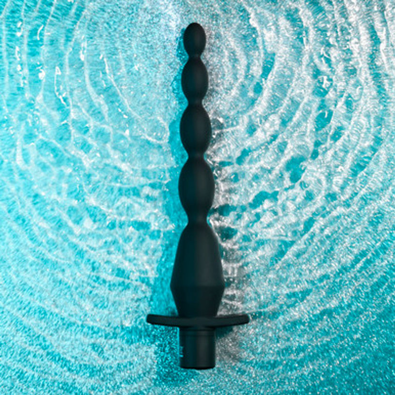 Selopa Vibrating Butt Beads: black silicone anal beads that grow in size toward a wide flat safety base