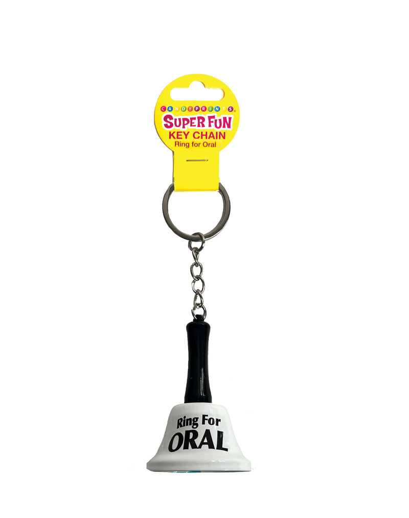 Little Genie Super Fun Key Chain Ring for Oral: small white bell with black handle on a metal key ring, on its card