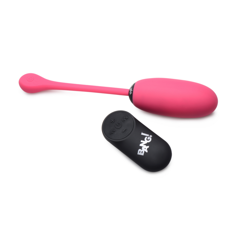 Bang! plush egg vibrator with remote in pink: velvety pink egg with a cord control tail and black wireless remote