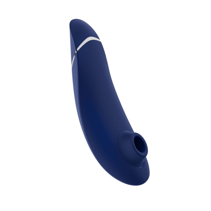 Womanizer Premium 2 in blueberry: curved navy blue Pleasure Air clitoral stimulator with a silver accent band