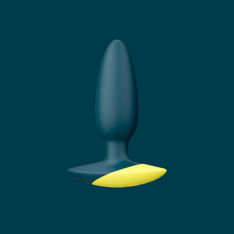 Romp Bass: dark teal vibrating anal plug with a tapered tip and a flared yellow base, front view