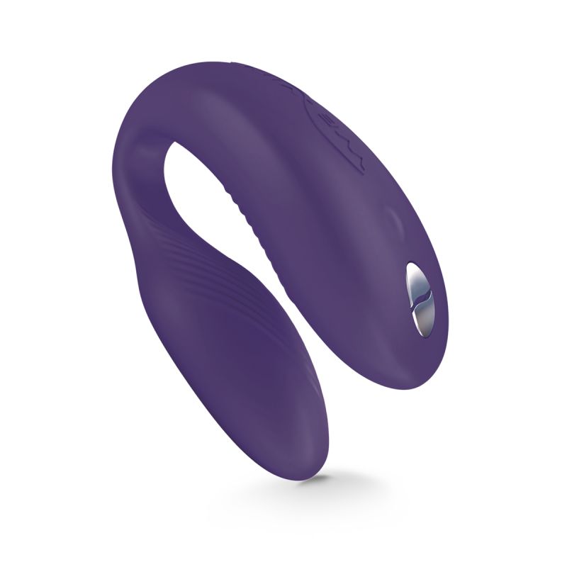 We-Vibe Sync in purple: C-shaped couples vibrator with a ribbed inner arm and silver charging port