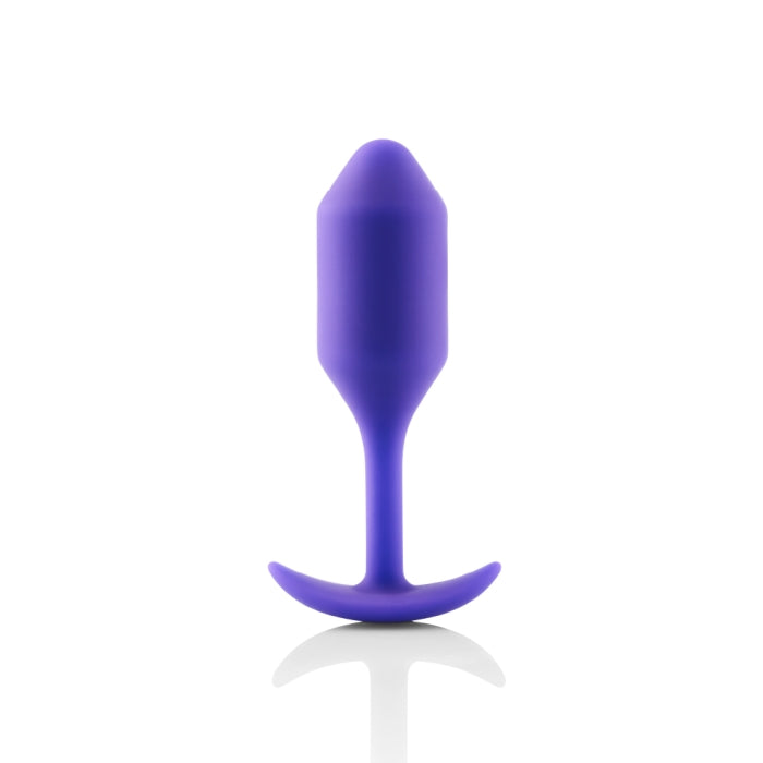 b-Vibe Snug Plug 2 in purple: weighted silicone butt plug with a slim neck and anchor base