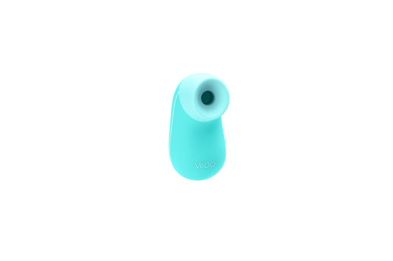 VeDO Nami Sonic in turquoise: compact silicone clitoral suction vibrator with a round mouth opening, angled view