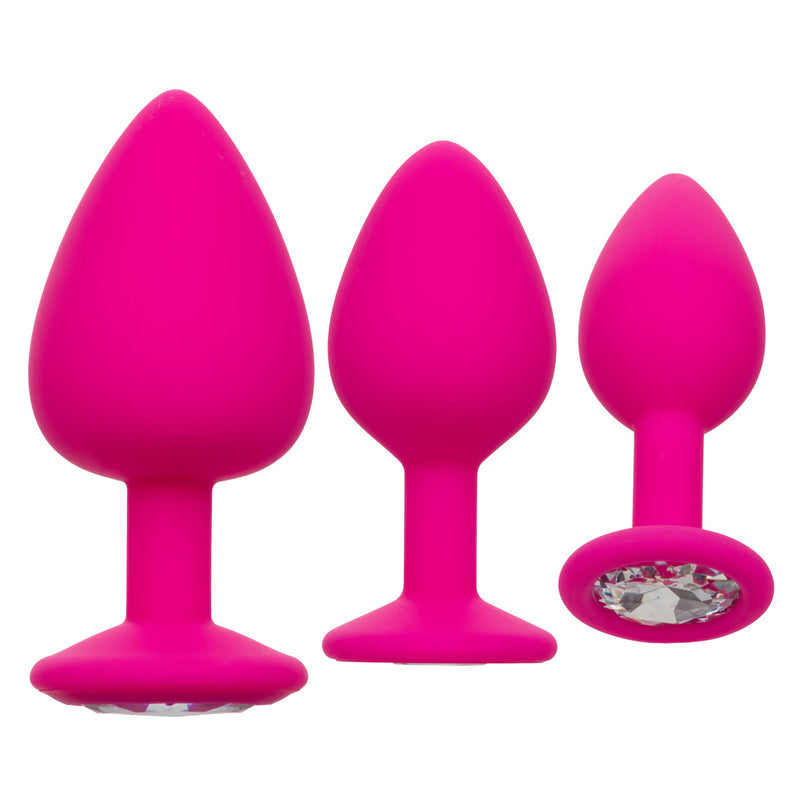 CalExotics Cheeky Gems: set of 3 graduated pink silicone anal plugs with clear gem bases