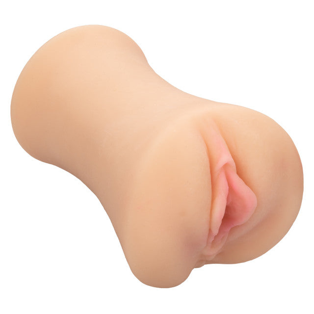 CalExotics Stroke It Wet Ass Pussy in ivory: realistic closed-end masturbator, angled view of the entry