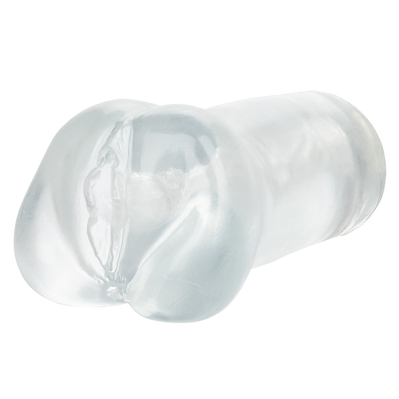CalExotics Stroke It Tight Pussy in clear: see-through closed-end masturbator, angled view of the entry