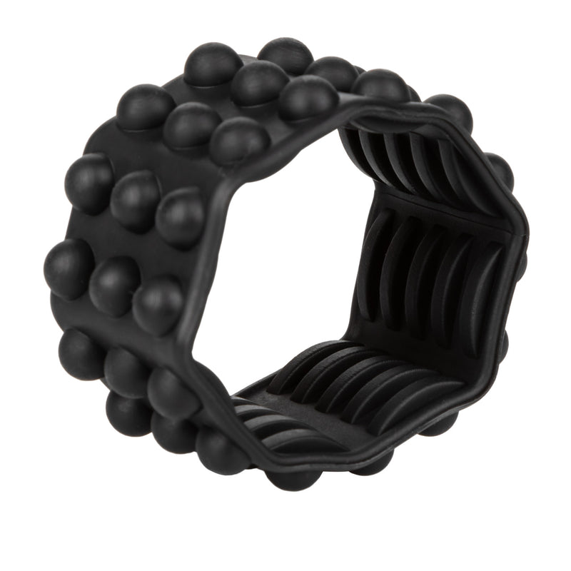 CalExotics Adonis Silicone Reversible Ring: black stretchy cock ring sleeve with beads on one side and ridges on the other