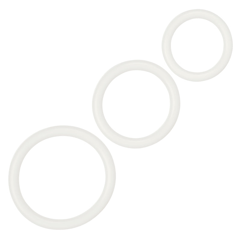CalExotics Tri-Rings Glow in the Dark: three white stretchy cock rings in graduated sizes