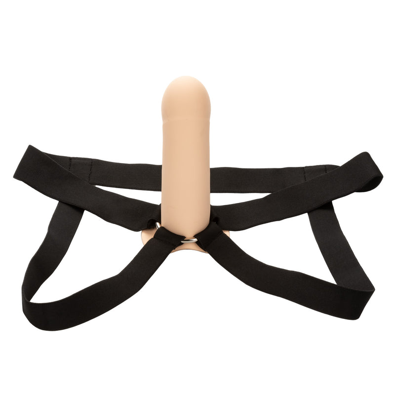 CalExotics Performance Maxx Extension with Harness in ivory: smooth hollow strap-on sleeve on black elastic straps