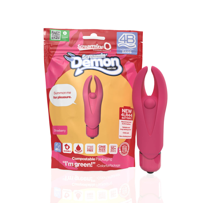 Screaming O 4B Screamin Demon mini vibe in strawberry: pink bullet with flexible horn tips, beside its package