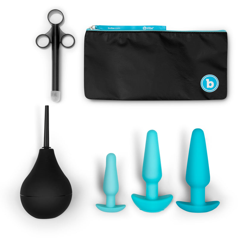b-Vibe Anal Training and Education Set: three teal silicone butt plugs, black bulb douche, lube applicator and storage bag