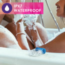 IPX7 waterproof: blue Pleasure Ring resting on the edge of a bubble bath
