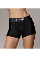 Ouch! Vibrating Strap-On Boxer in black: strap-on harness boxer briefs with an O-ring opening, front view on a model