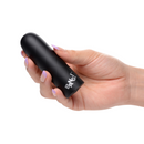 Black Bang! Mega Bullet held in one hand to show its size