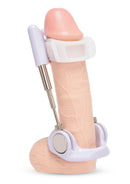 Size Up 10 piece penis enlargement kit: white and lavender extender with adjustable metal rods on a realistic display model