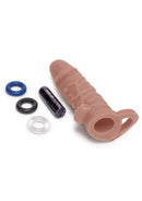 Tan Size Up extender laid out with its black bullet vibrator and blue, black and clear cock rings