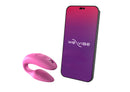 Pink We-Vibe Sync beside a phone showing the We-Vibe app