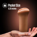 Pocket size: Molly stroker held on an open palm, 5.25 inches