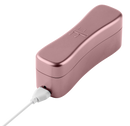 Rose gold FemmeFunn charging case with its USB cable plugged in