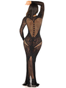 Back view of the black lace net gown showing the heart-shaped fishnet back and flared hem