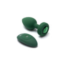 b-Vibe Vibrating Jewel Plug in emerald, M/L: green silicone anal plug with a green gem base and matching remote