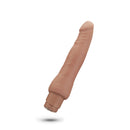 Tan Miguel vibrating dildo at an angle