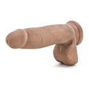 Tan Sensa Feel 7 in dildo lying on its side, angled view of the tip