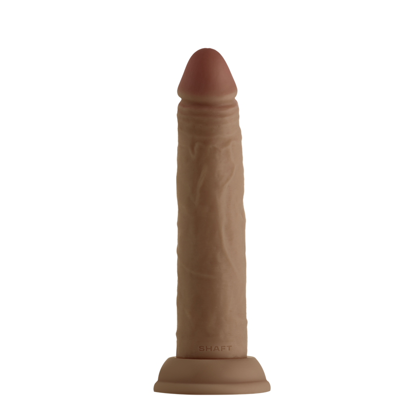 Shaft Model J 7.5 inch dildo in oak: tan dual-layer liquid silicone realistic dildo without balls on a suction cup