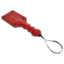 Sportsheets Saffron Square Paddle: red vegan leather square paddle with a wavy grip and black wrist strap