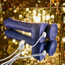 Pleasure Rider charging with its magnetic USB cable attached at the base