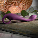 Purple Lochness lying on slate, showing the loop handle and flat tip