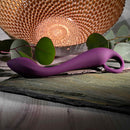 Purple Lochness lying on slate, side view of the curved shaft and loop handle