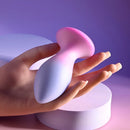 Paradise Plug resting in an open hand to show its size