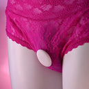 Paradise panty vibe clipped to pink lace panties on a mannequin, showing the white magnetic clip