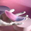 Paradise panty vibe resting on a white display hand, showing its curved inner side