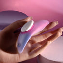 Paradise panty vibe in an open hand, showing the white magnetic clip and charging contacts