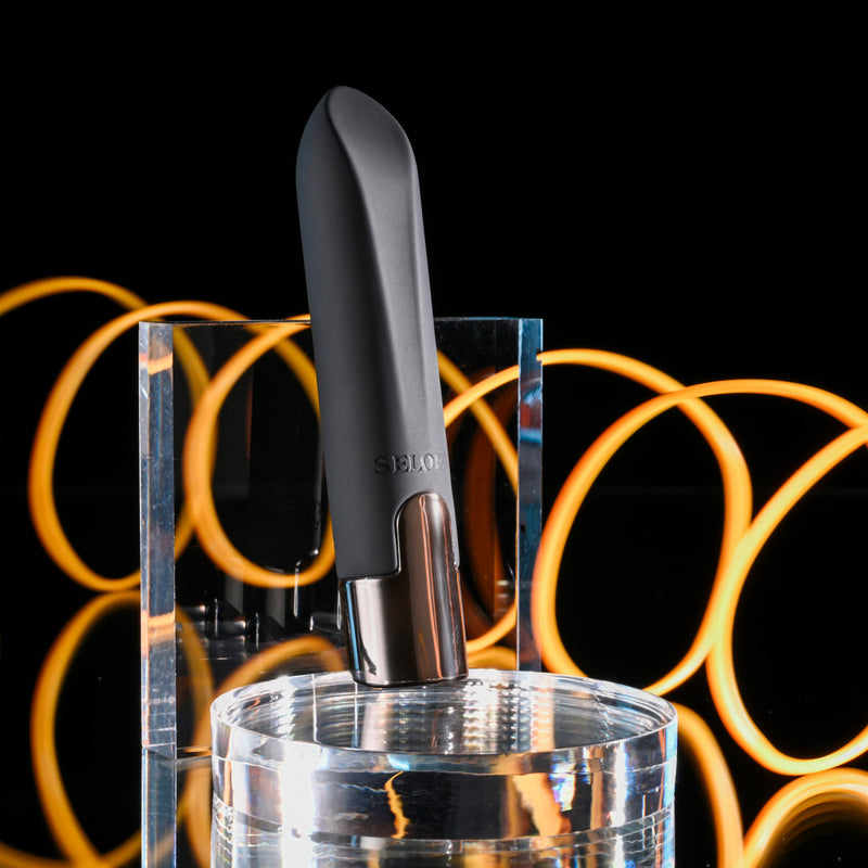Selopa Little Buddy: charcoal gray silicone bullet vibrator with an angled tip and gunmetal base