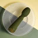 Selopa Heartfelt: olive green silicone mini wand vibrator with a ridged rounded head