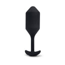Black Vibrating Snug Plug 4 with the base turned slightly to one side