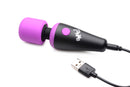 Purple Bang! mini wand with its black USB charging cable plugged into the base