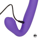 Close-up of the purple Love Rider charging with its USB cord, USB rechargeable