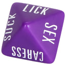 Purple action die close-up with the words Lick, Sex, Caress and Suck